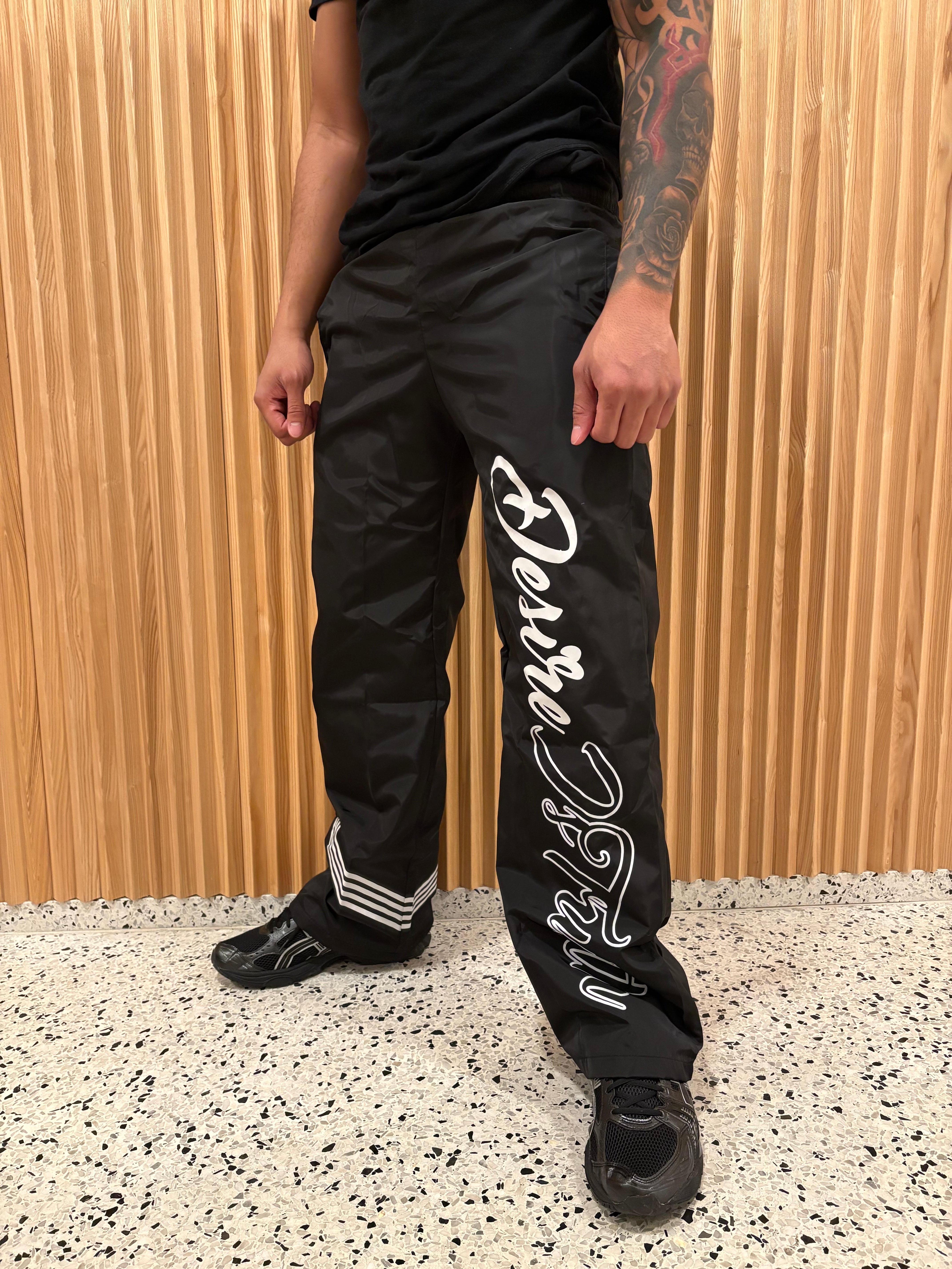 Black Desire is Truth Trackpants